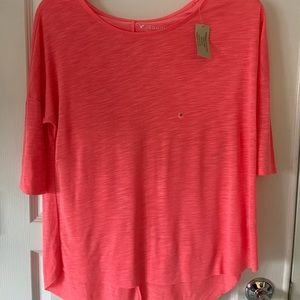 Salmon colored Medium three quarters sleeve t-shirt. Very thin/see thru material